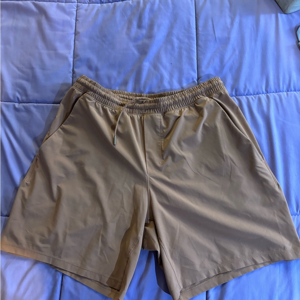 Men’s L lululemon pale orange shorts